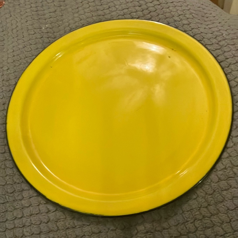 Yellow vintage enamel plate